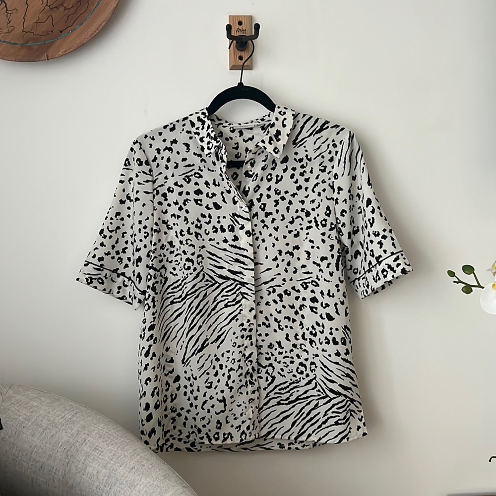Short sleeve button down tee. Small.